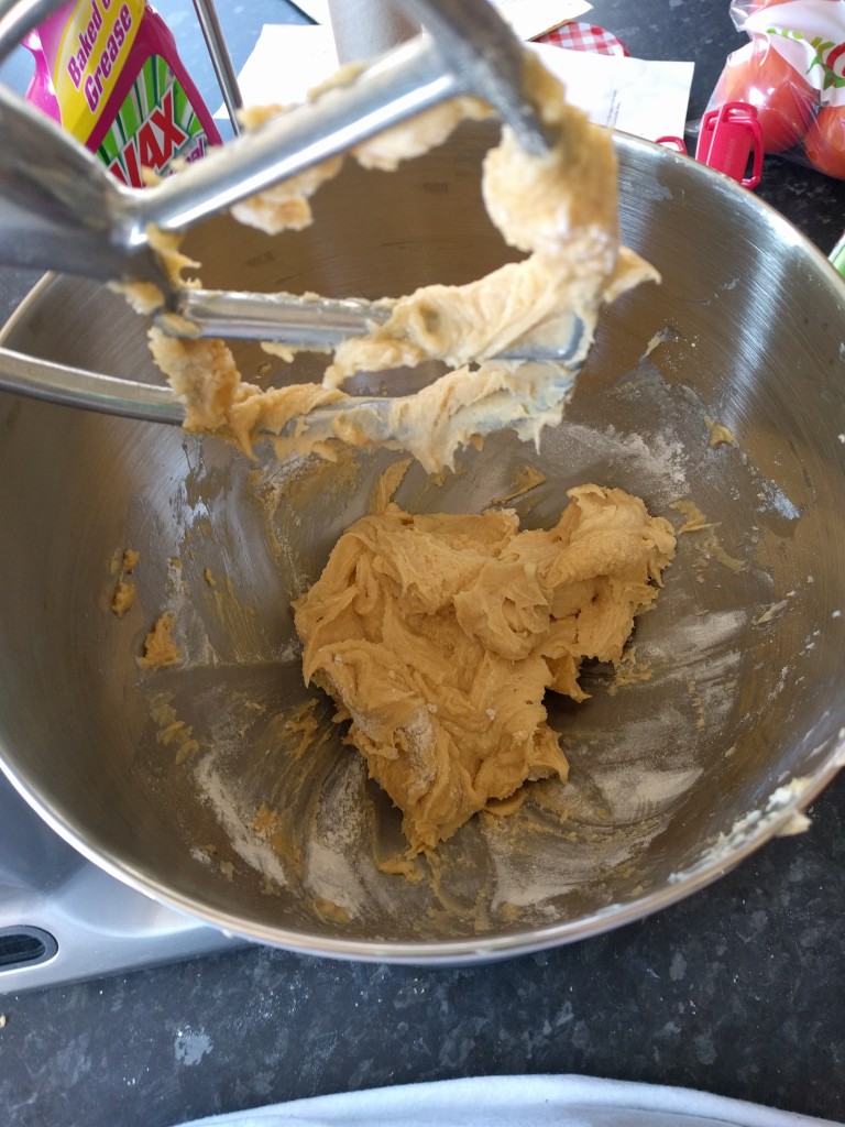 Mix in the flour then scrape the sides of the bowl.